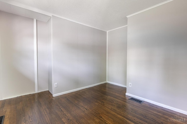 3803 Hampton Pl, Middletown, OH 45042 - spare room with wood finished floors, ornamental molding, and a textured ceiling
