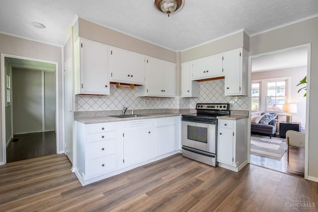 3803 Hampton Pl, Middletown, OH 45042 - kitchen featuring stainless steel electric range, dark wood-style floors, white cabinets, decorative backsplash, and light countertops
