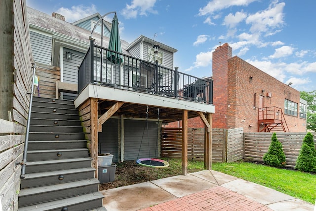 1117 Cypress St, Cincinnati, OH 45206 - back of property featuring stairs, a wooden deck, and a patio area