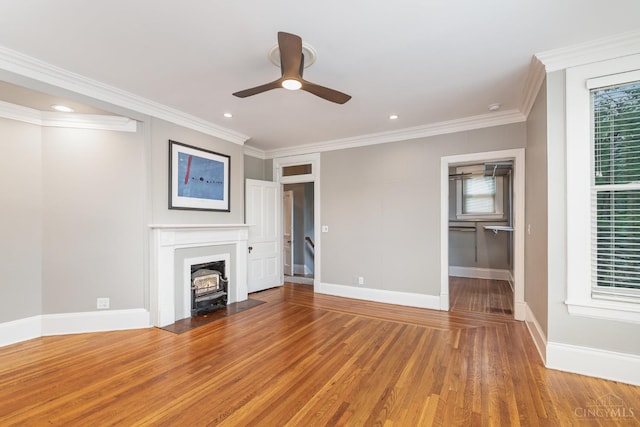 1117 Cypress St, Cincinnati, OH 45206 - unfurnished living room featuring light wood finished floors, a ceiling fan, ornamental molding, healthy amount of natural light, and recessed lighting