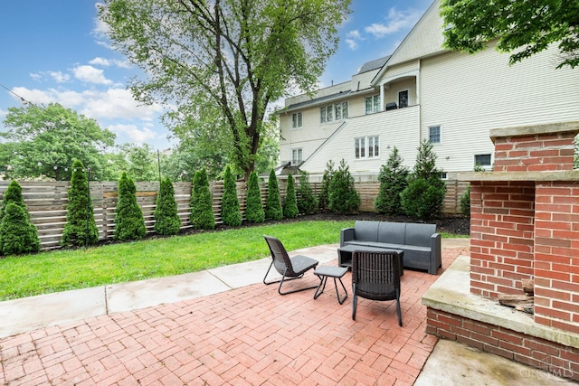1117 Cypress St, Cincinnati, OH 45206 - fenced backyard featuring an outdoor living space and a patio