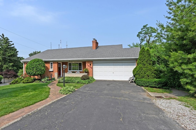 7423 View Place Dr, Springfield Twp, OH 45224 - ranch-style home featuring driveway, a garage, a front yard, a chimney, and brick siding
