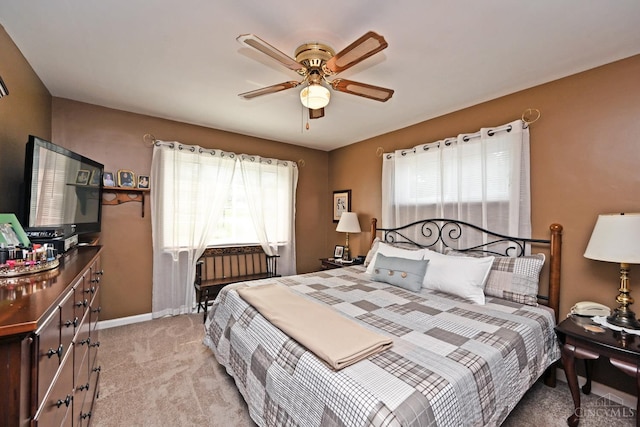 7423 View Place Dr, Springfield Twp, OH 45224 - carpeted bedroom with baseboards and ceiling fan