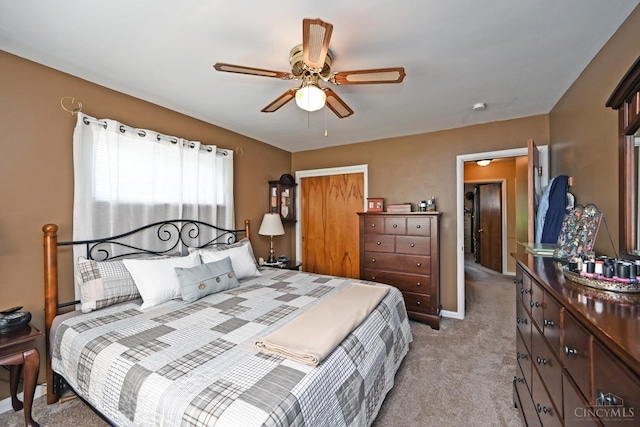 7423 View Place Dr, Springfield Twp, OH 45224 - bedroom with light colored carpet, a closet, and ceiling fan