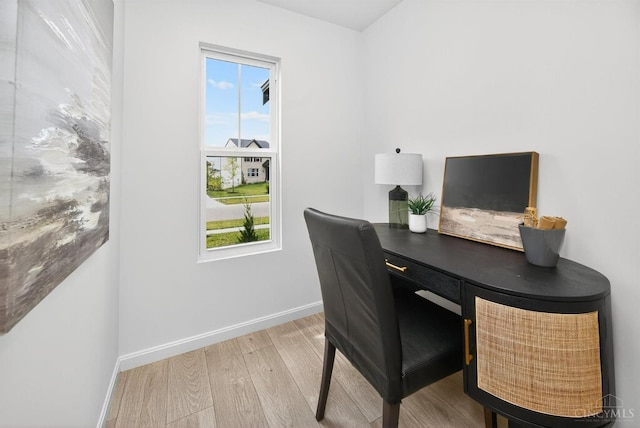 5322 Observer Ct, Turtle Creek Twp, OH 45036 - office area featuring wood finished floors and healthy amount of natural light