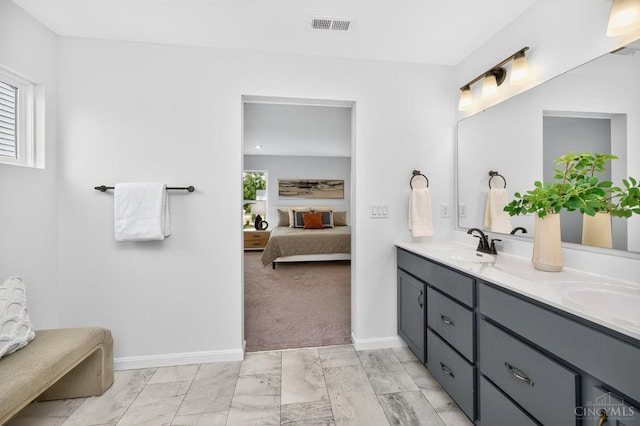 5322 Observer Ct, Turtle Creek Twp, OH 45036 - bathroom featuring connected bathroom, double vanity, and marble finish flooring