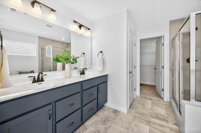 5322 Observer Ct, Turtle Creek Twp, OH 45036 - full bathroom featuring double vanity, a shower stall, and a walk in closet