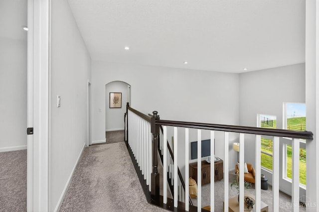 5322 Observer Ct, Turtle Creek Twp, OH 45036 - hall with carpet floors, arched walkways, an upstairs landing, and recessed lighting