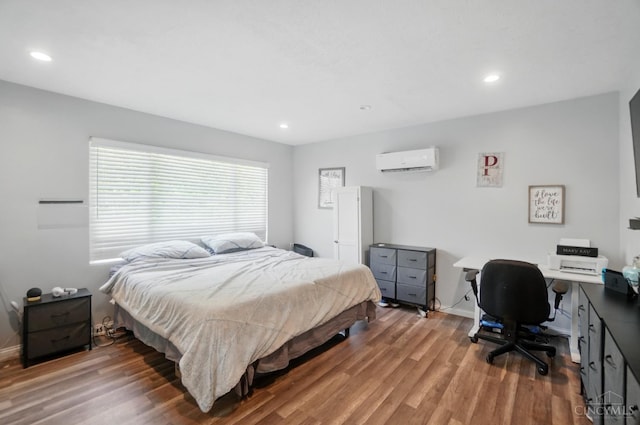 1643 Biscayne Dr, Saint Clair Twp, OH 45013 - bedroom featuring a wall mounted air conditioner, wood finished floors, recessed lighting, and an office area