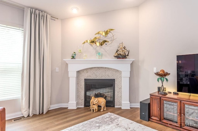 9302 W Meadow Dr, West Chester, OH 45069 - living area with wood finished floors and a fireplace