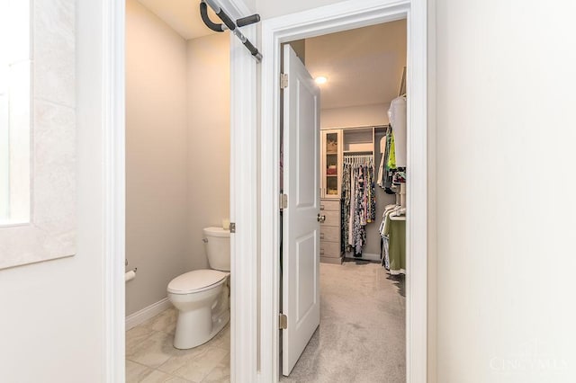 9302 W Meadow Dr, West Chester, OH 45069 - bathroom featuring toilet and a walk in closet