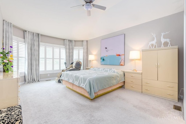 9302 W Meadow Dr, West Chester, OH 45069 - bedroom with light carpet and a ceiling fan