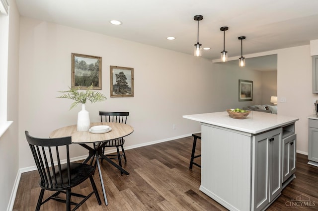 601 Comet Dr, Union Twp, OH 45244 - kitchen with a breakfast bar, light countertops, dark wood-style floors, gray cabinets, and recessed lighting