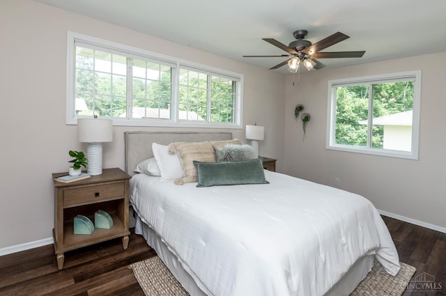 601 Comet Dr, Union Twp, OH 45244 - bedroom featuring multiple windows, dark wood-type flooring, and ceiling fan