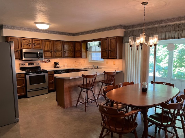 44 Strathmore Blvd, Athens, OH 45701 - dining room with a chandelier