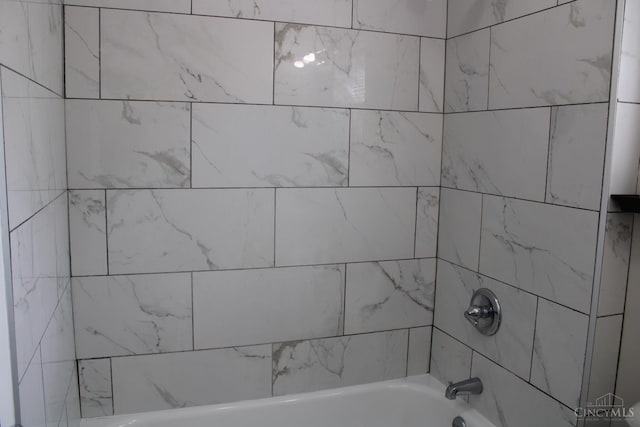 1841 Carll St, Cincinnati, OH 45225 - full bathroom featuring washtub / shower combination