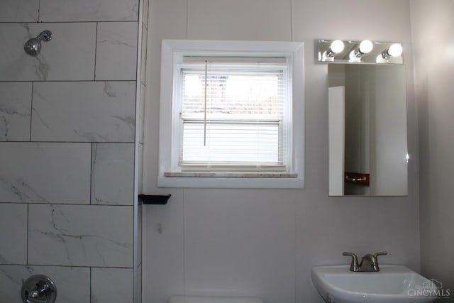 1841 Carll St, Cincinnati, OH 45225 - bathroom featuring a sink and a shower