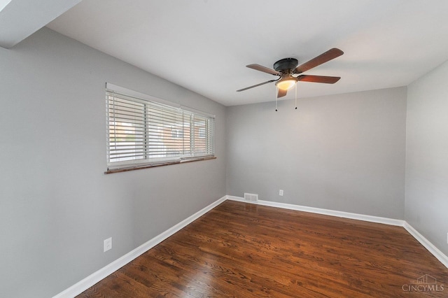 5611 Glengate Ln, Cincinnati, OH 45212 - spare room with a ceiling fan and dark wood-type flooring