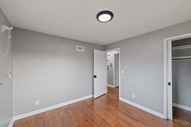 5611 Glengate Ln, Cincinnati, OH 45212 - unfurnished bedroom featuring wood finished floors and baseboards