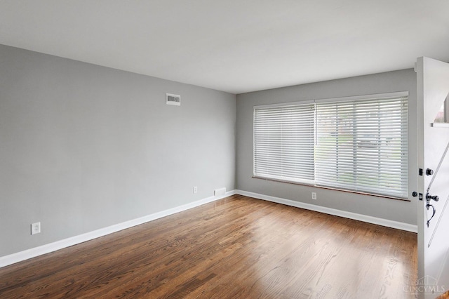 5611 Glengate Ln, Cincinnati, OH 45212 - unfurnished room featuring baseboards and wood finished floors