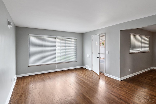5611 Glengate Ln, Cincinnati, OH 45212 - spare room featuring wood finished floors and baseboards