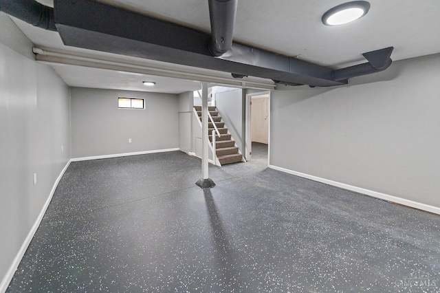5611 Glengate Ln, Cincinnati, OH 45212 - below grade area featuring baseboards and stairs