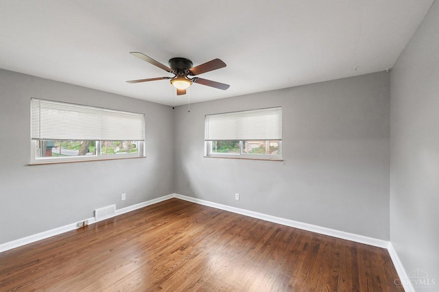 5611 Glengate Ln, Cincinnati, OH 45212 - spare room featuring wood finished floors and a ceiling fan