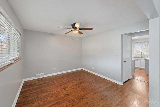 5611 Glengate Ln, Cincinnati, OH 45212 - unfurnished room with ceiling fan and wood finished floors