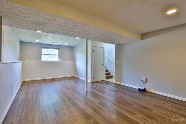 115 Treeline Ct, Harrison, OH 45030 - basement featuring stairway, wood finished floors, and recessed lighting