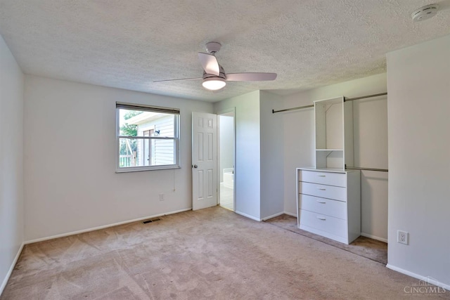 115 Treeline Ct, Harrison, OH 45030 - unfurnished bedroom featuring light carpet, a textured ceiling, and a ceiling fan