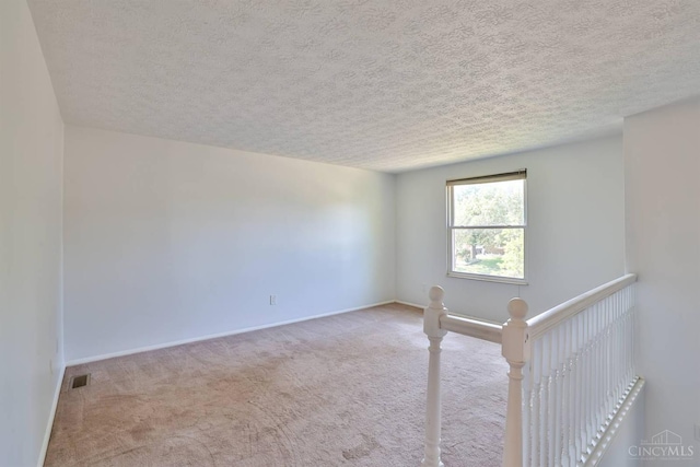 115 Treeline Ct, Harrison, OH 45030 - carpeted empty room with a textured ceiling and baseboards