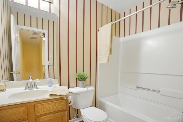 4653 Cardinal Dr, Union Twp, OH 45244 - bathroom featuring wallpapered walls, vanity, and tub / shower combination