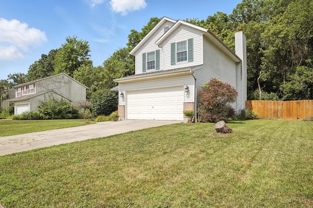 4653 Cardinal Dr, Union Twp, OH 45244 - traditional-style house featuring concrete driveway, a garage, a chimney, and brick siding