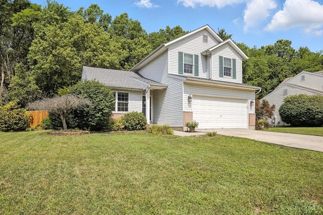 4653 Cardinal Dr, Union Twp, OH 45244 - traditional-style home with a garage, driveway, and brick siding
