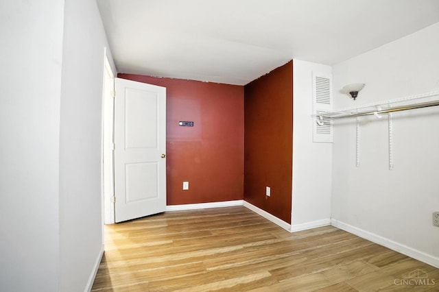 4653 Cardinal Dr, Union Twp, OH 45244 - unfurnished bedroom featuring light wood finished floors and baseboards