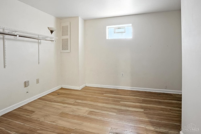 4653 Cardinal Dr, Union Twp, OH 45244 - below grade area with light wood-type flooring and baseboards