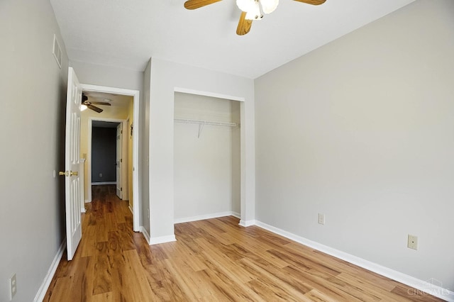 4653 Cardinal Dr, Union Twp, OH 45244 - unfurnished bedroom with light wood finished floors, a closet, and ceiling fan