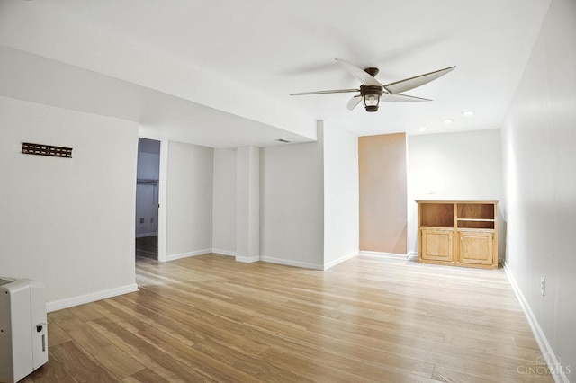 4653 Cardinal Dr, Union Twp, OH 45244 - unfurnished living room with a ceiling fan and light wood-style flooring