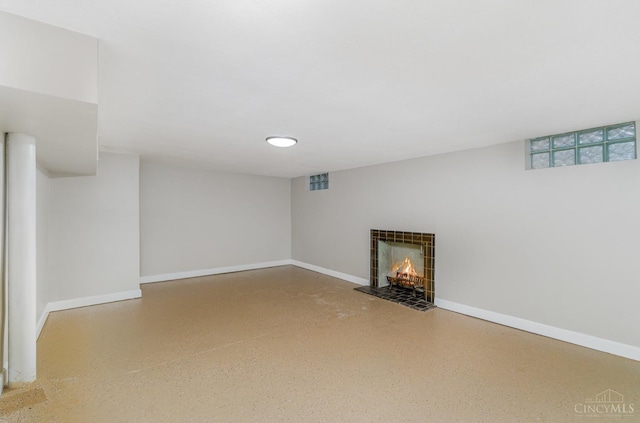 1427 Beaverton Ave, Cincinnati, OH 45237 - below grade area with baseboards and a tiled fireplace