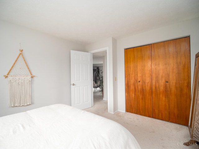 355 Grand Ave Unit 302, Cincinnati, OH 45205 - bedroom with light colored carpet and a closet