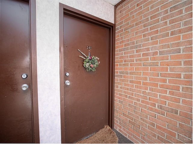 355 Grand Ave Unit 302, Cincinnati, OH 45205 - doorway to property featuring brick siding