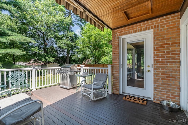 1107 Covedale Ave, Cincinnati, OH 45238 - wooden terrace featuring a storage unit and area for grilling