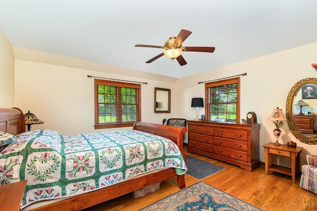 1107 Covedale Ave, Cincinnati, OH 45238 - bedroom featuring multiple windows, wood finished floors, and a ceiling fan