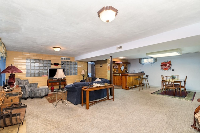1107 Covedale Ave, Cincinnati, OH 45238 - living room with bar area and carpet floors