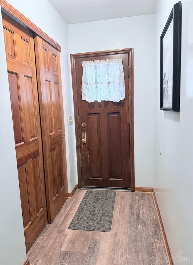 1107 Covedale Ave, Cincinnati, OH 45238 - foyer entrance featuring light wood-style flooring and baseboards
