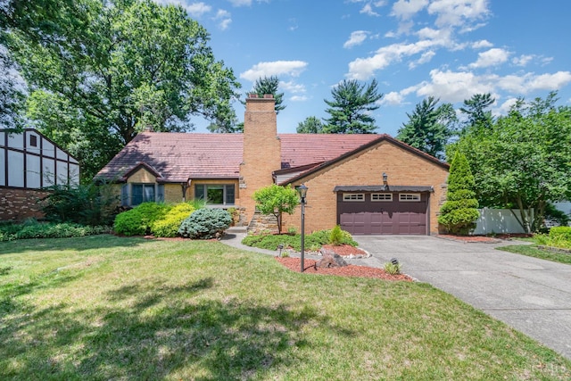 1107 Covedale Ave, Cincinnati, OH 45238 - view of front of property with a garage, driveway, a chimney, and brick siding