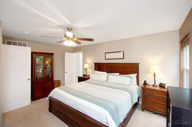 6711 Bayberry Ct, Hamilton Twp, OH 45039 - bedroom with light colored carpet and a ceiling fan