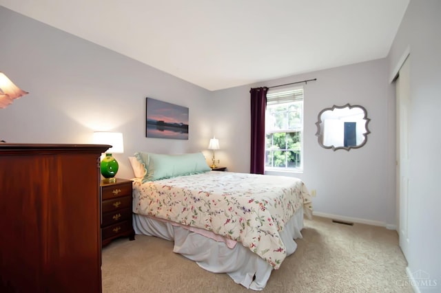 6711 Bayberry Ct, Hamilton Twp, OH 45039 - bedroom with light colored carpet and baseboards