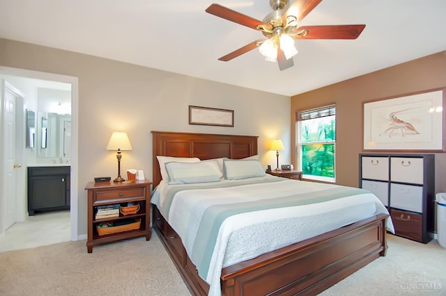 6711 Bayberry Ct, Hamilton Twp, OH 45039 - bedroom with light carpet, connected bathroom, and ceiling fan