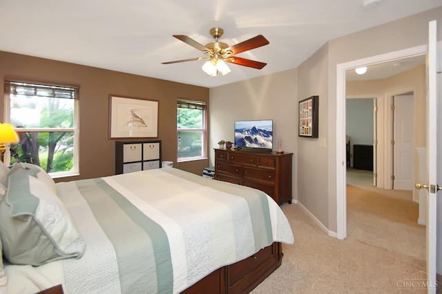6711 Bayberry Ct, Hamilton Twp, OH 45039 - bedroom with light colored carpet and ceiling fan